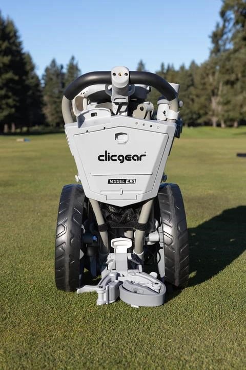Chariot de golf manuel blanc, châssis et roues visibles