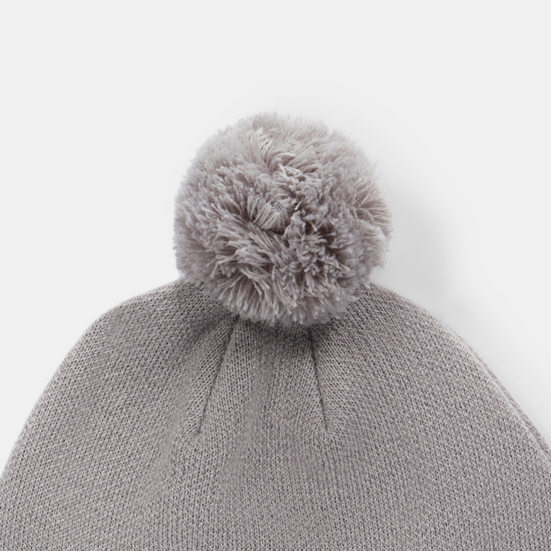 Pompon classique sur le dessus