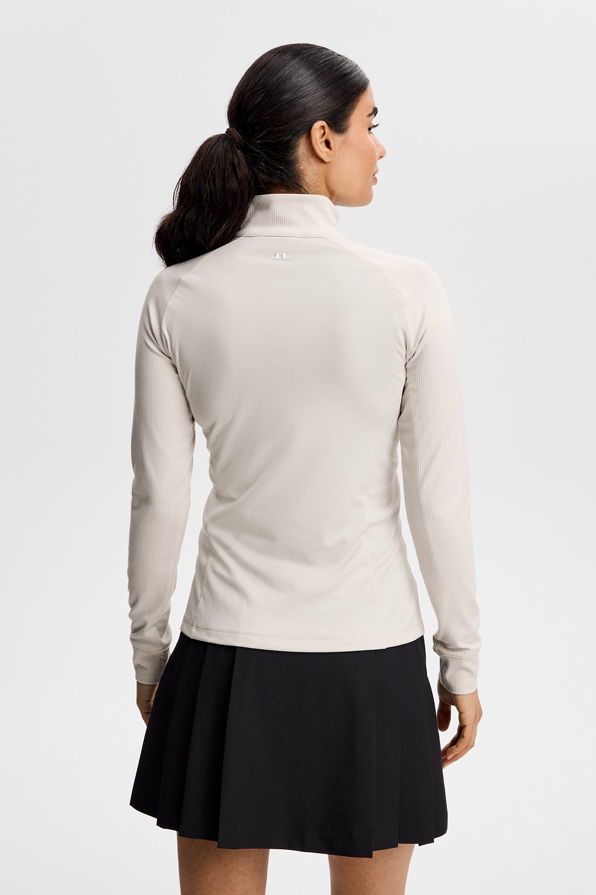 Couche intermédiaire J.Lindeberg Mel Rib Moonbeam – détail du zip frontal et des coutures