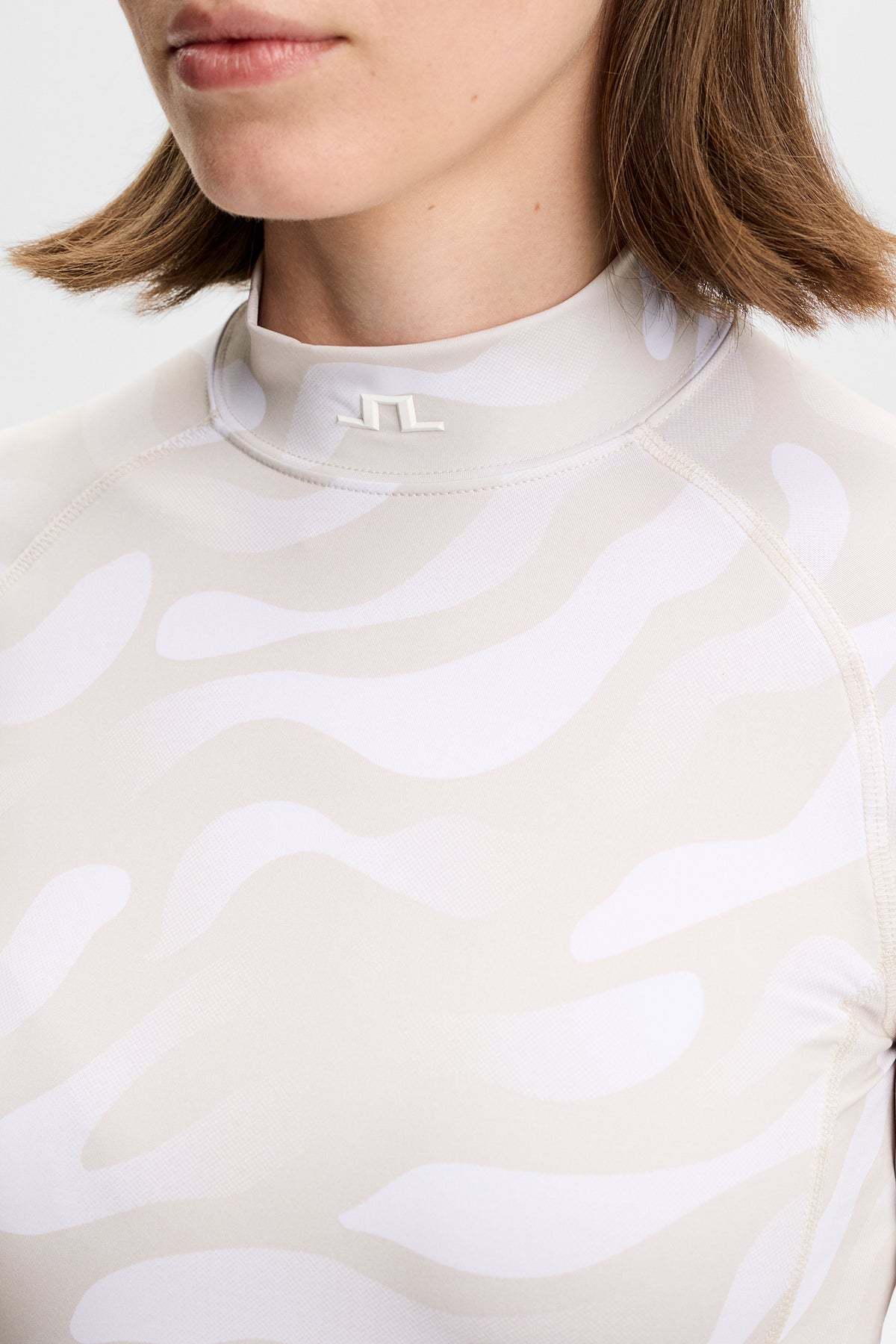 Haut de compression J.Lindeberg Ella Print &ndash; UPF 40+ et gestion de l'humidité