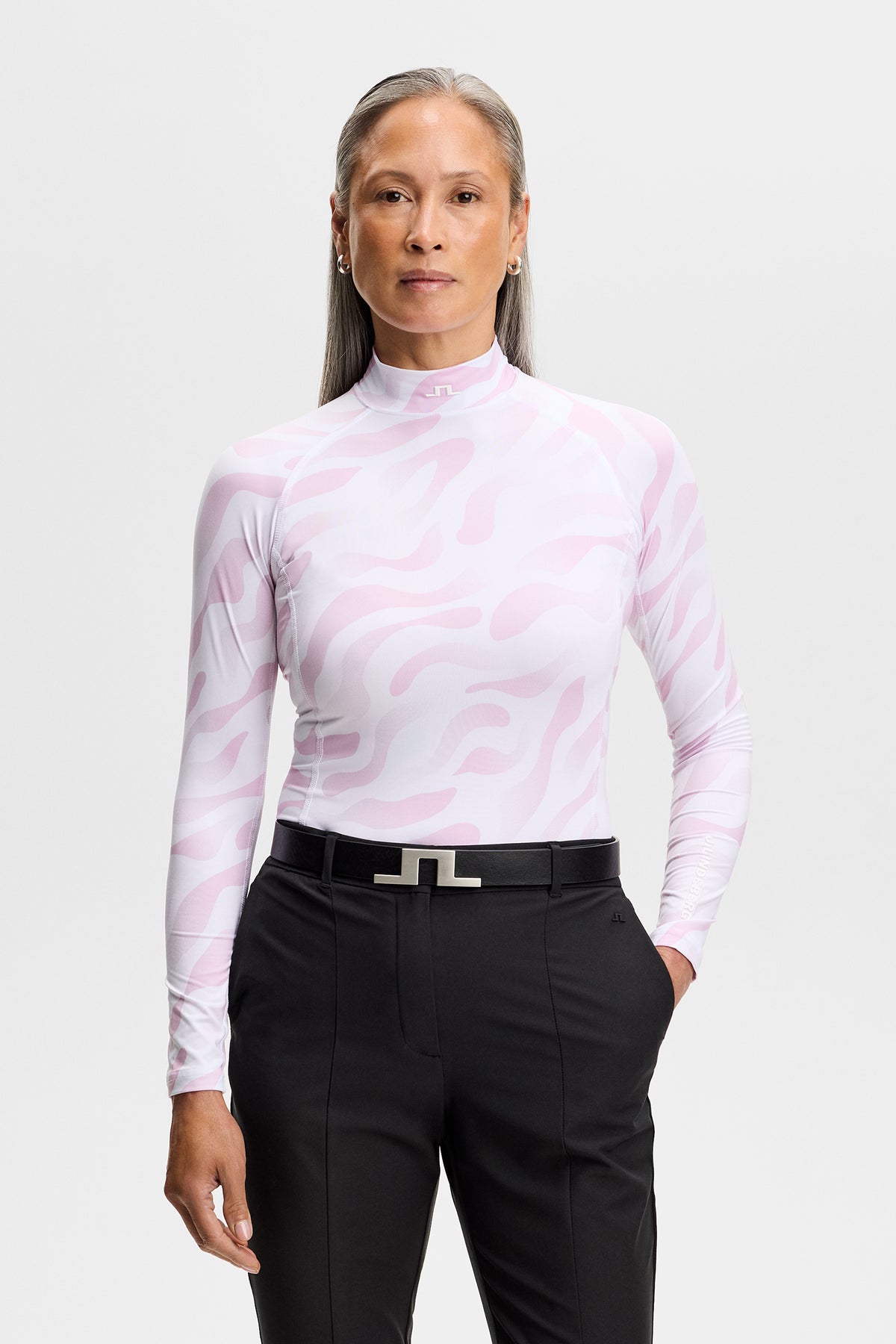 Haut de compression J.Lindeberg Ella Print Bunker Fade Blanc Orchidée – vue de face sur mannequin
