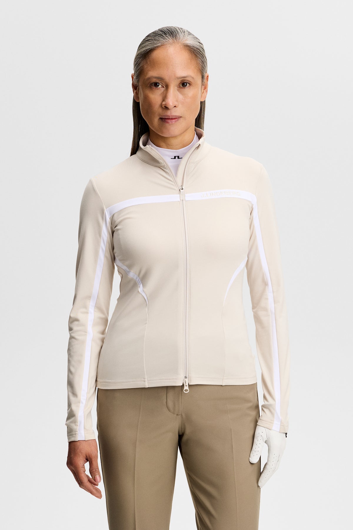 J.Lindeberg Janice Mid Layer Moonbeam – vue de face montrant le tissu Light Mid et le détail de la fermeture éclair